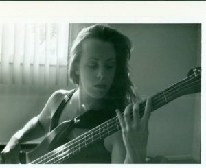 Health IT Rockstar, Susan Clark, with Bass Guitar
